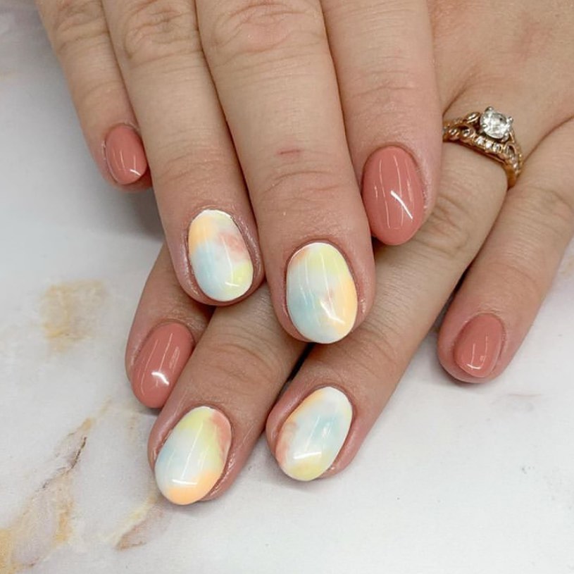 Get Artsy with 25 Tie-Dye Nail Designs in 2024 25 Glossy Round Tie-Dye Nails