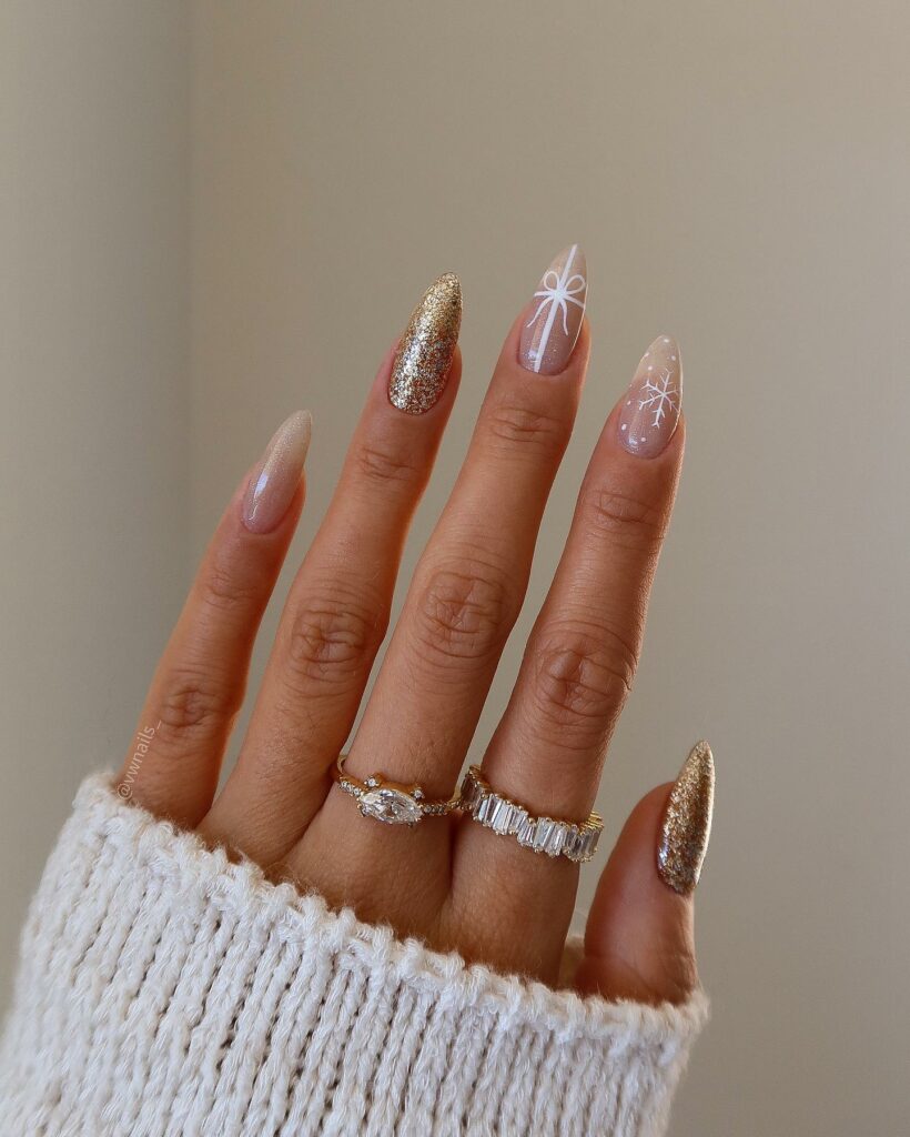 Feel Festive with 30 Christmas Almond Nail Ideas in 2024 26 Christmas Almond Nails with Gold Glitter