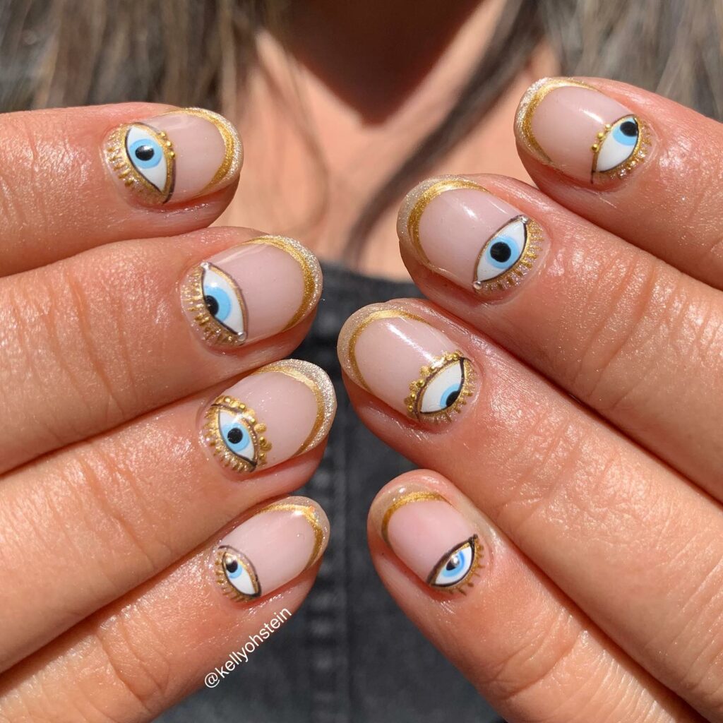 Channel Mystique with 20 Evil-Eye Nail Designs for 2024 14 Gold-Flake Evil-Eye Nails
