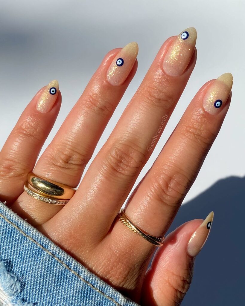 Channel Mystique with 20 Evil-Eye Nail Designs for 2024 13 Gold Nails