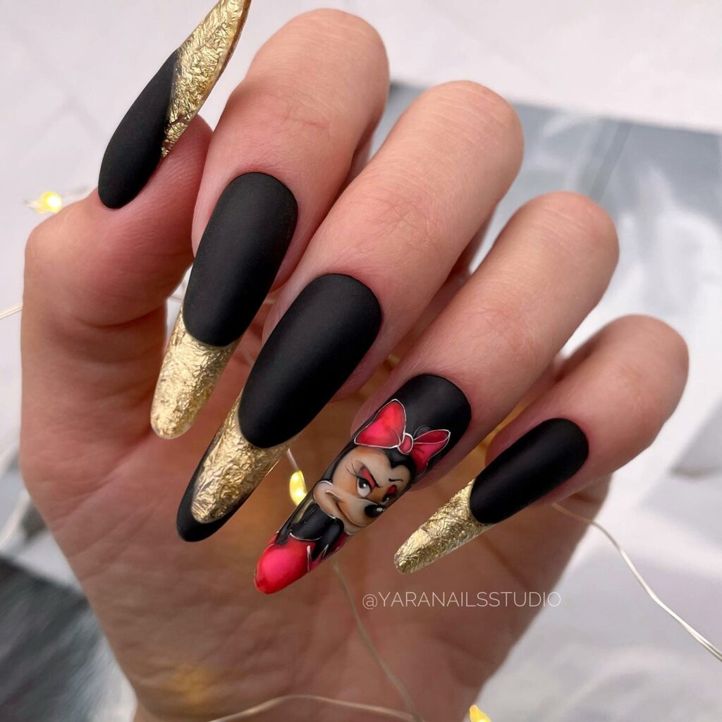 Enjoy 64 Cartoon Nails to Try in 2024 23 Gold Accents with Matte Black Cartoon Nails