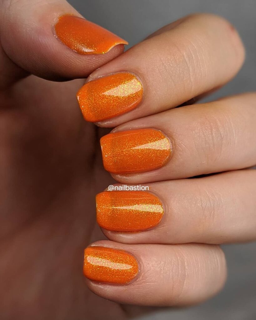 40 Latest Orange Nail Designs to Try in 2024 34 Golden Orange Shimmer