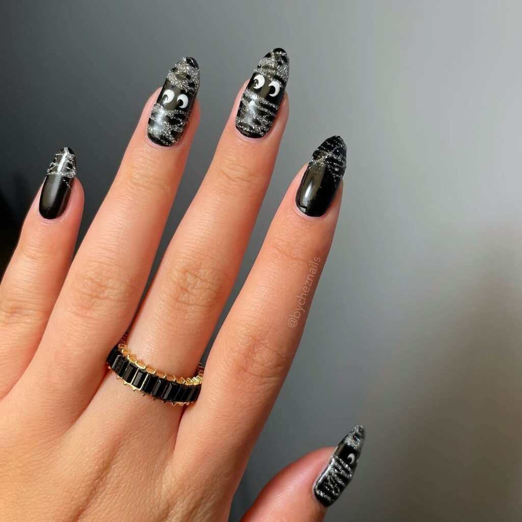 Get Spooky with 33 Black Halloween Nails To Try in 2024 24 Gothic Black Halloween nails