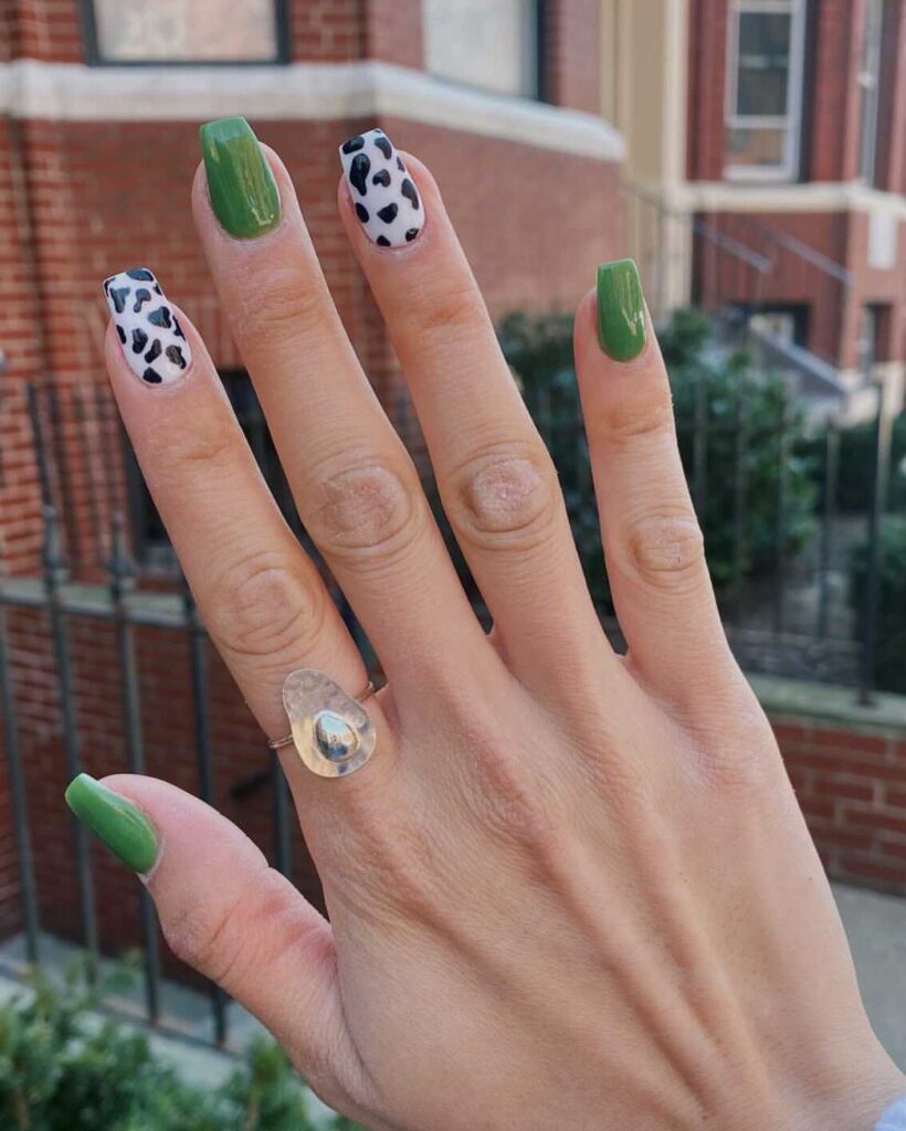 Get Creative with 39 Cute Short Nails Designs for 2024 31 Green and Cow Print Nails