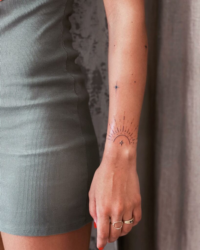 10+ Small Sun Tattoo Designs That Will Blow Your Mind! 17 Half Sun With Scattered Rays And Stars ideas