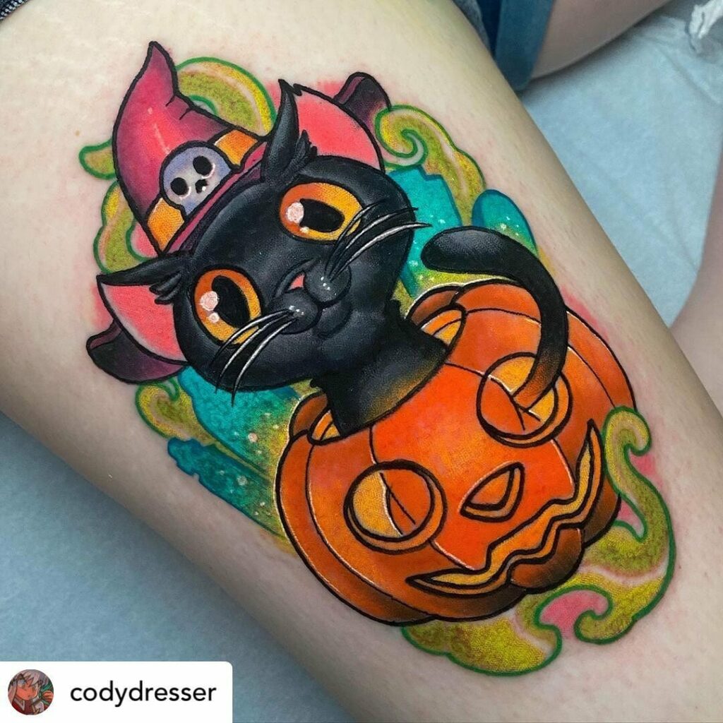 33 Halloween Tattoo Ideas for 2024 14 Halloween Cat Tattoo