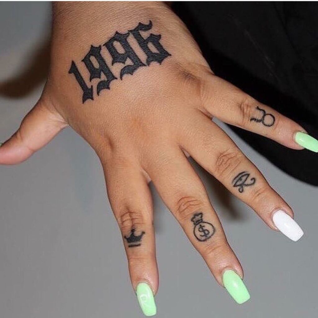 10 Birth Year Tattoo Ideas for 2024 14 Hand Birth Year Tattoo