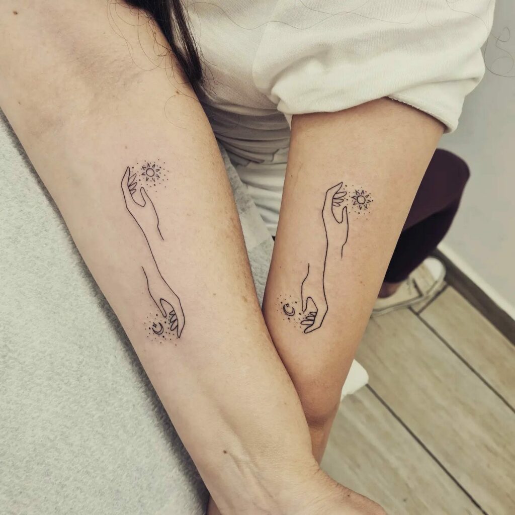 10+ Matching Sun And Moon Tattoo Ideas That Will Blow Your Mind! 11 Hand Holding Sun And Moon Matching Tattoo