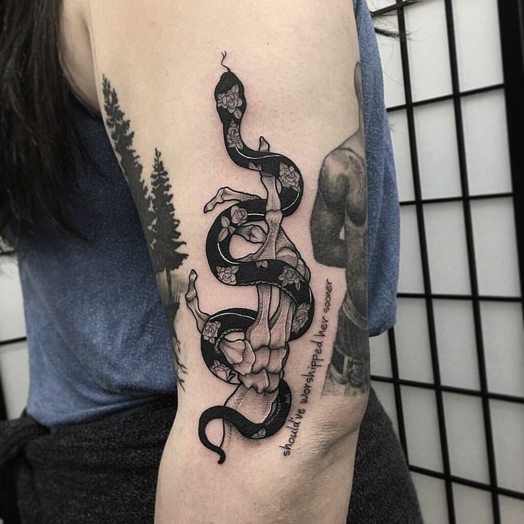 34 Hand Skeleton Tattoo Designs for 2024 15 Hand Skeleton with Snake Tattoo