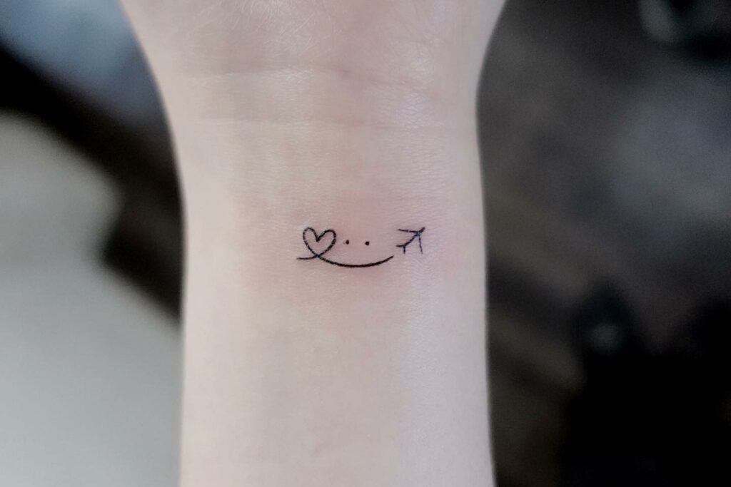 11+ Wrist Heart Tattoo Ideas That Will Blow Your Mind! 15 Heart Smile Plane Tattoo On Wrist