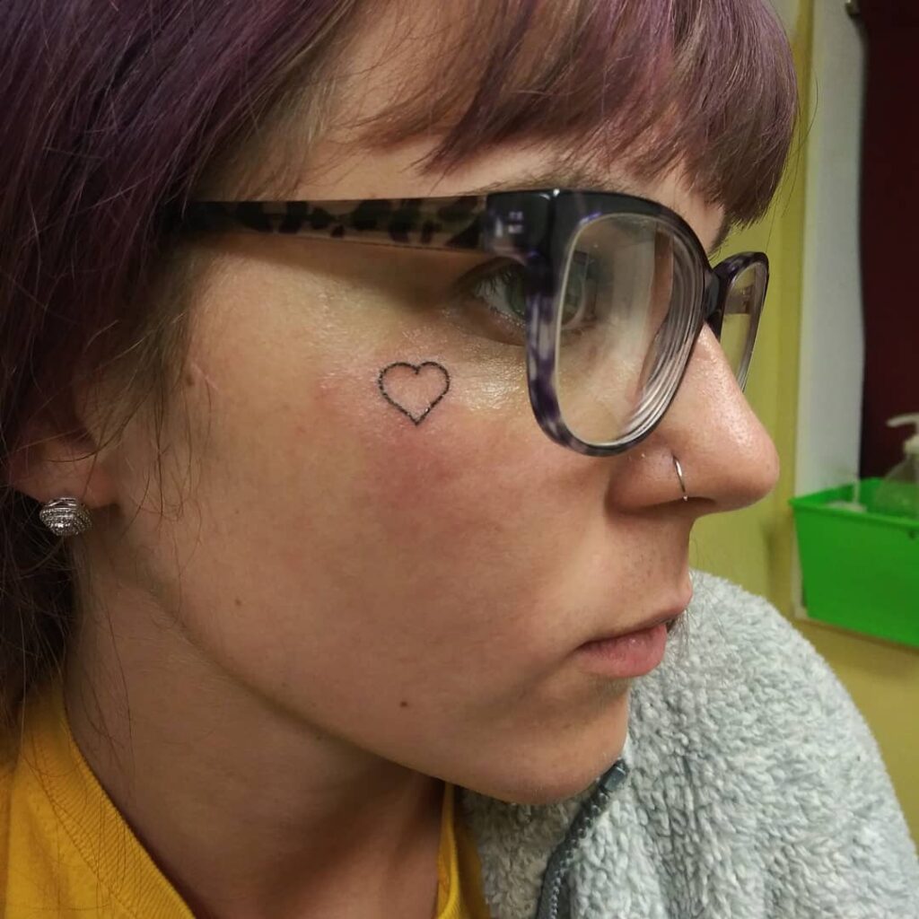 11+ Outline Heart Tattoo Ideas That Will Blow Your Mind! 11 Heart outline Tattoo on Face