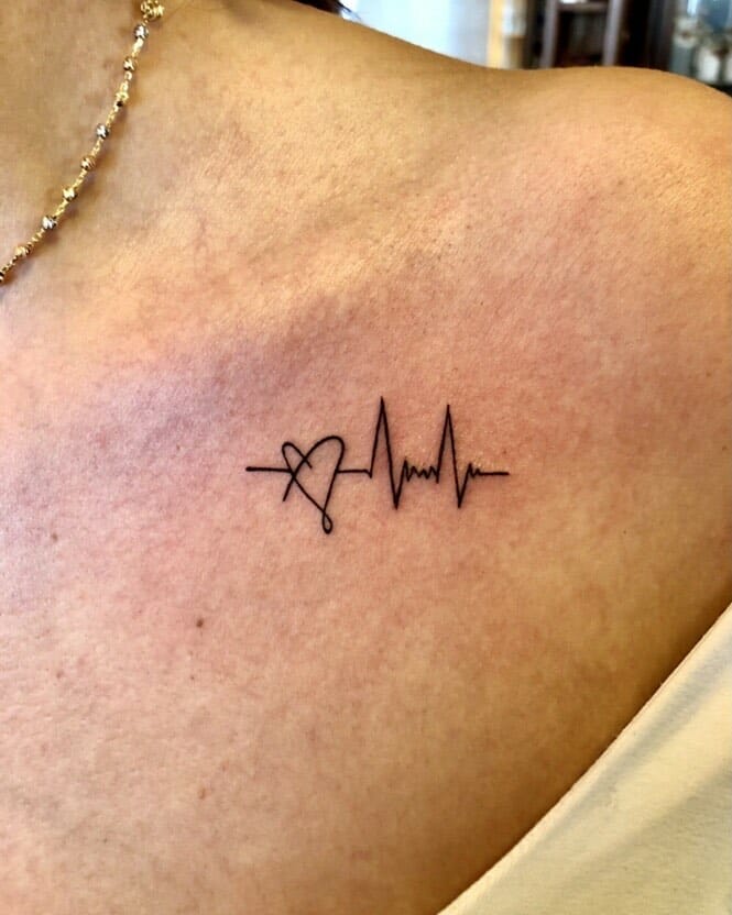 11+ Meaningful Heart Beat Tattoo Ideas That Will Blow Your Mind! 16 Heartbeat Tattoos On Chest