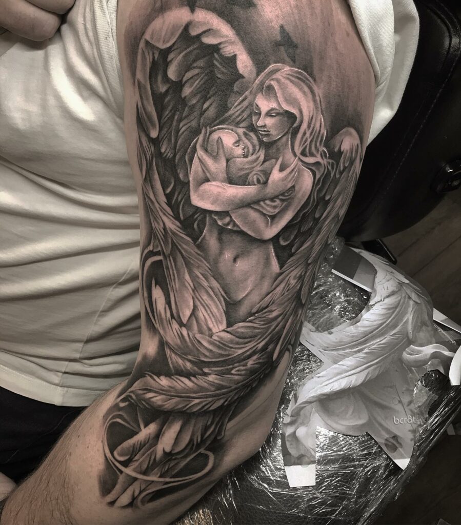 10+ Female Guardian Angel Tattoo Ideas That Will Blow Your Mind! 17 Holding Baby Fallen Angel Tattoos