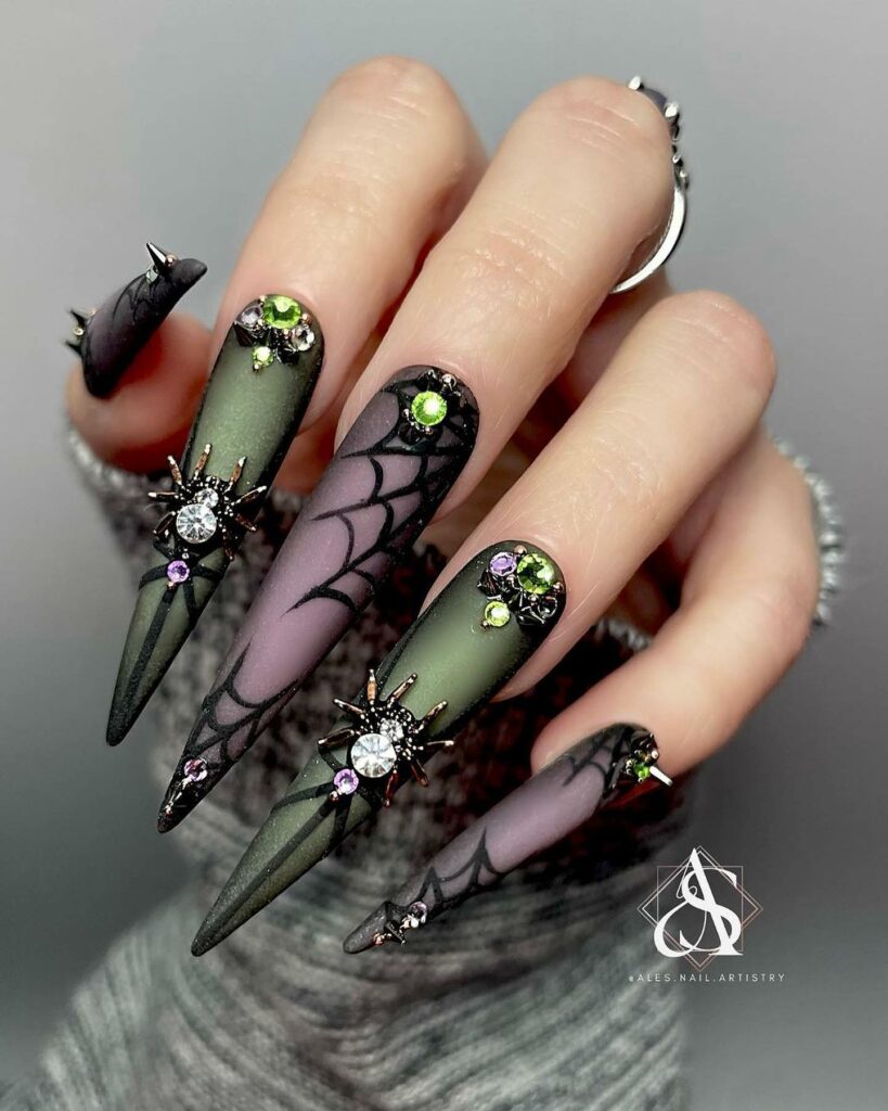 Get Spooky with 33 Black Halloween Nails To Try in 2024 28 Holographic spider web nails