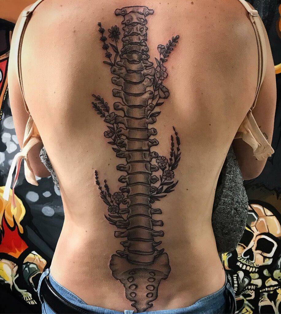 11+ Flower Spine Tattoo Ideas That Will Blow Your Mind! 16 Illustrated Spine Tattoo With Small Flowers