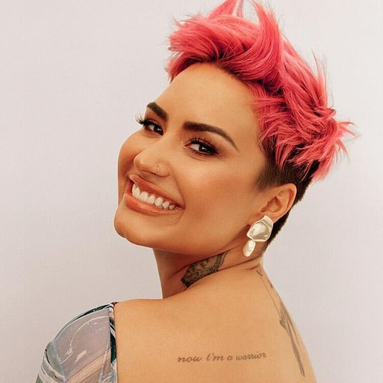 11+ Demi Lovato Tattoo That Will Blow Your Mind 14 'I'm a warrior' Tattoo at the Back
