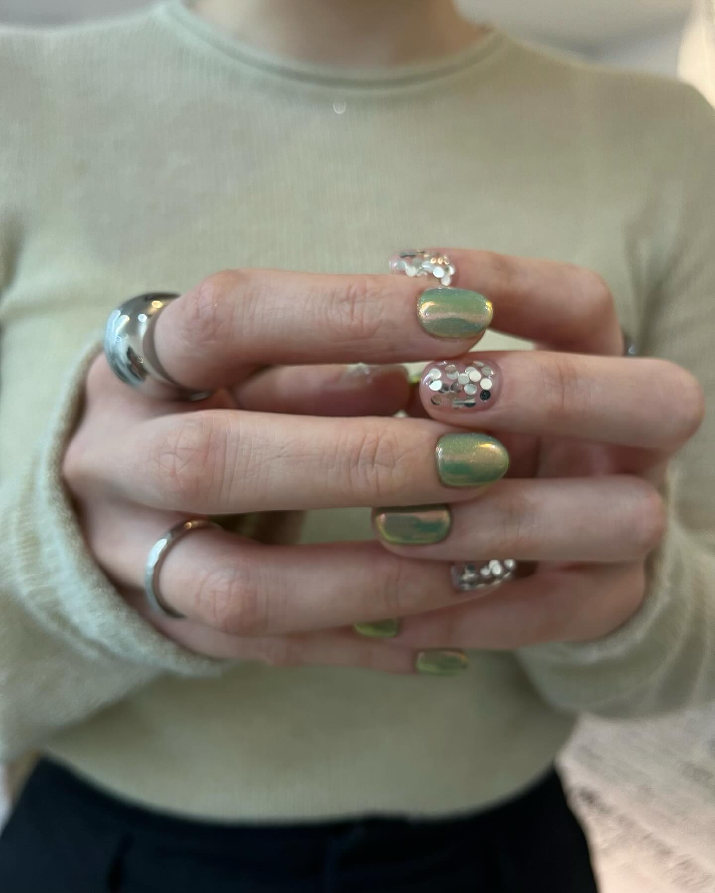 20 Latest Green Nail Designs To Try Today ✨ 16 Iridescent Green Fantasy with Glittery Charm