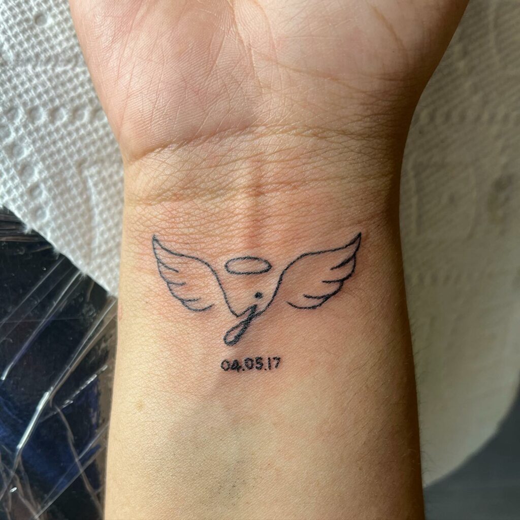 10+ J Letter Tattoo Ideas That Will Blow Your Mind! 19 J Letter Angel Wings Tattoo Designs