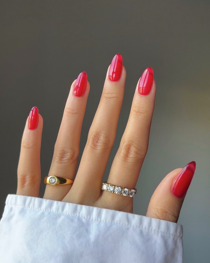 Celebrate with 33 Short Christmas Nail Ideas in 2024 23 Jelly Red Short Christmas Nails
