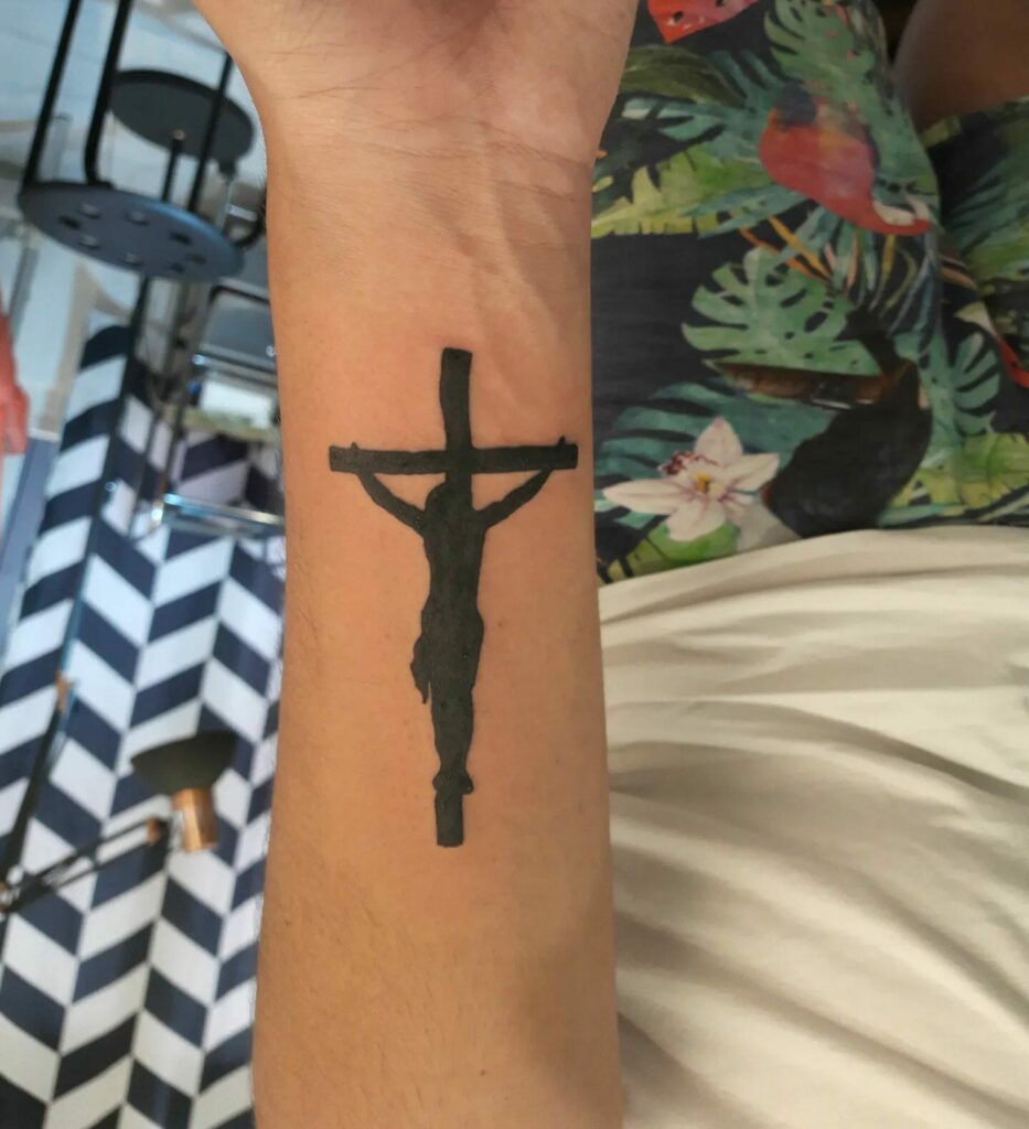 10+ Wrist Cross Tattoo Ideas That Will Blow Your Mind! 17 Jesus Christ Silhouette Cross Tattoo