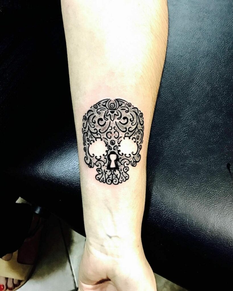 10+ Forearm Skull Tattoo Designs Which Will Blow Your Mind! 13 Keyhole Skull Hand Tattoo For Girls