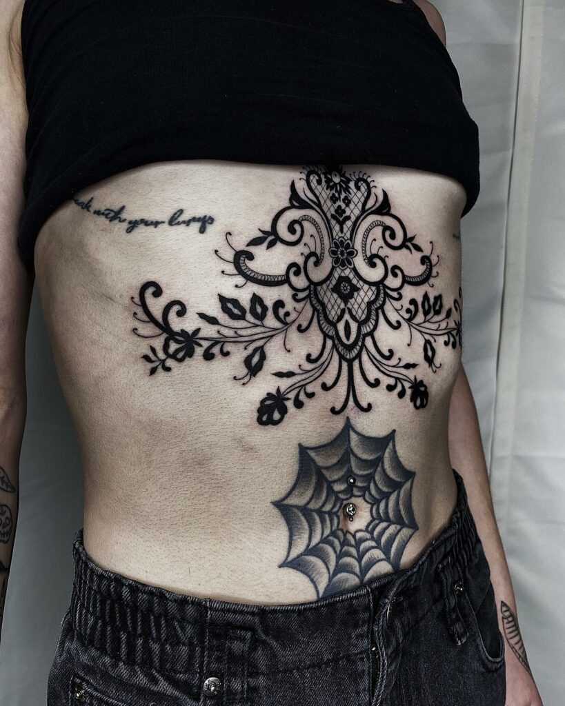 11+ Lace Under Breast Tattoo Designs That Will Blow Your Mind! 14 Lace Tattoo Under Breast Tattoo Design