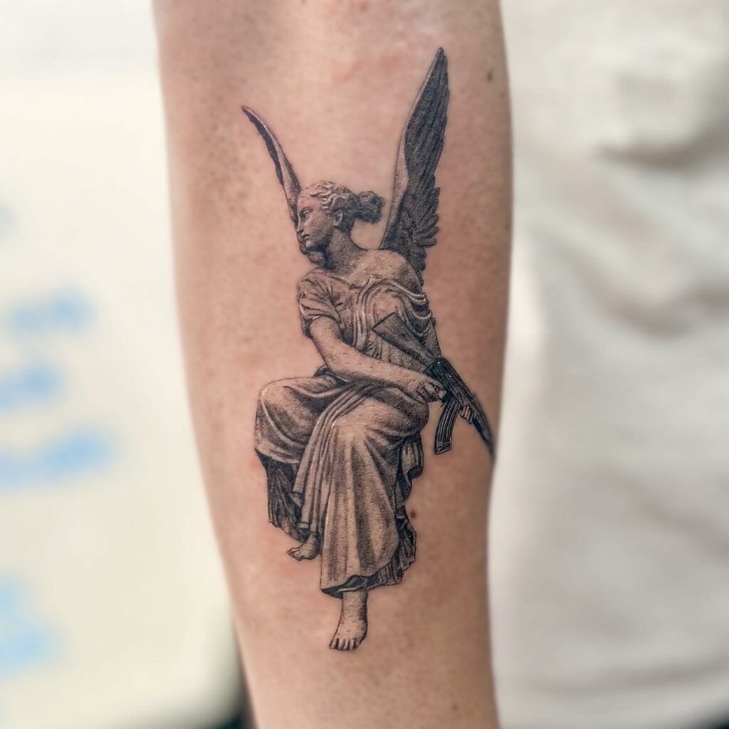 11+ Angel With Gun Tattoo Ideas That Will Blow Your Mind! 11 Lady Gangster Angel With Gun Tattoo