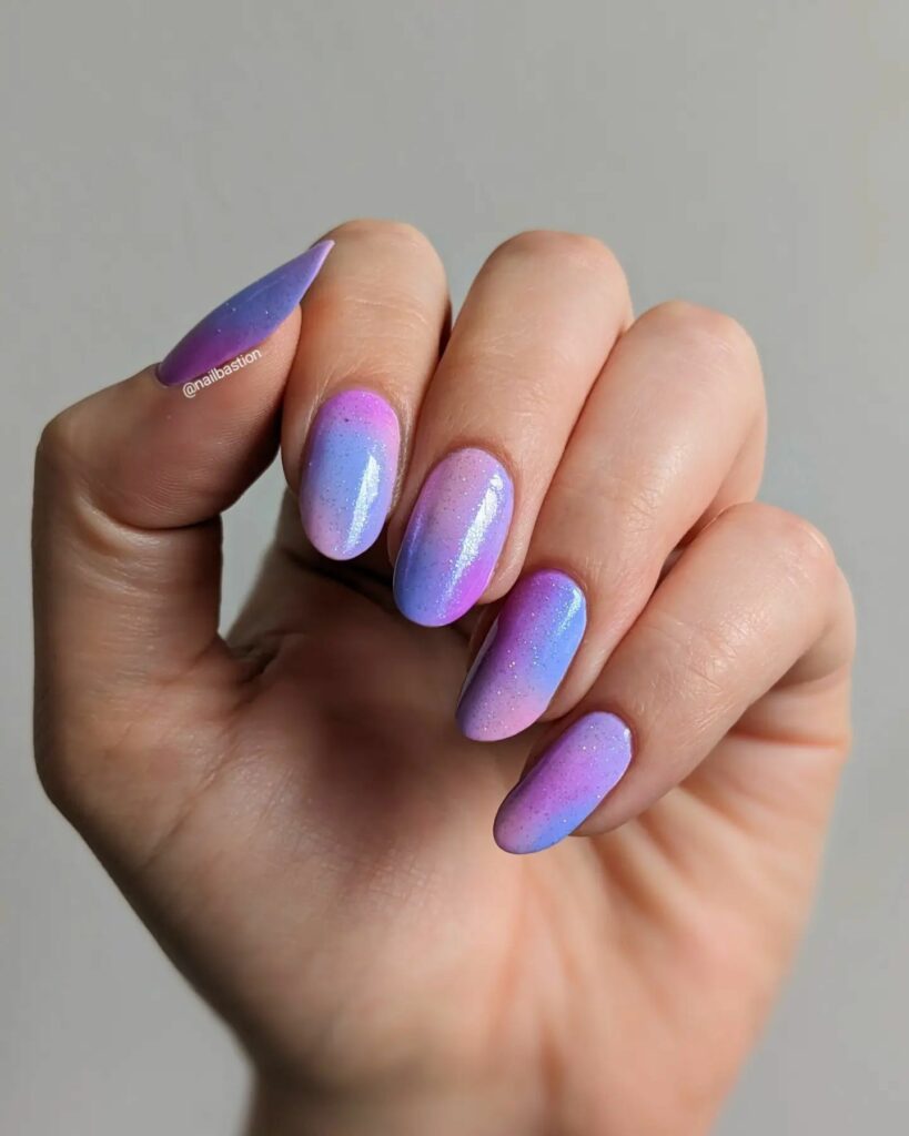 Get Artsy with 25 Tie-Dye Nail Designs in 2024 14 Lavender Whirl Sophisticated Tie-Dye Nails