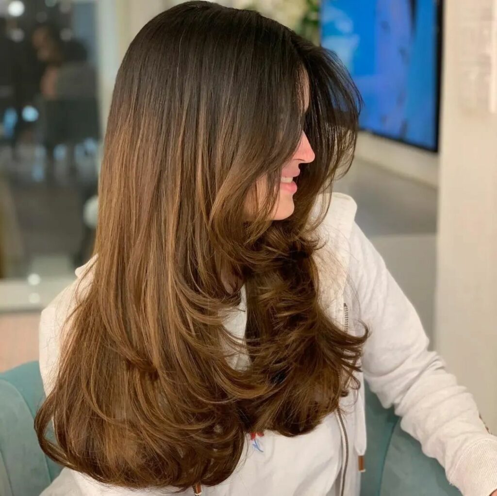 7 Best Ways to Style Your Layered Hair in 2024 20 Layers and Curtain Bangs