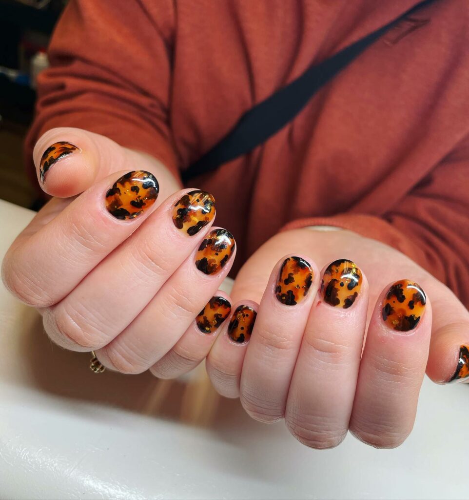 Stylish Burnt Orange Nail Trends of 2024 π 47 Leopard Print on Burnt Orange