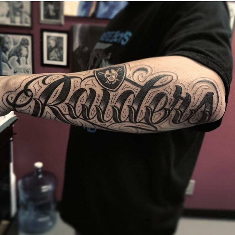 11+ Raiders Tattoo Ideas That Will Blow Your Mind! 16 Lettering Raiders Tattoo