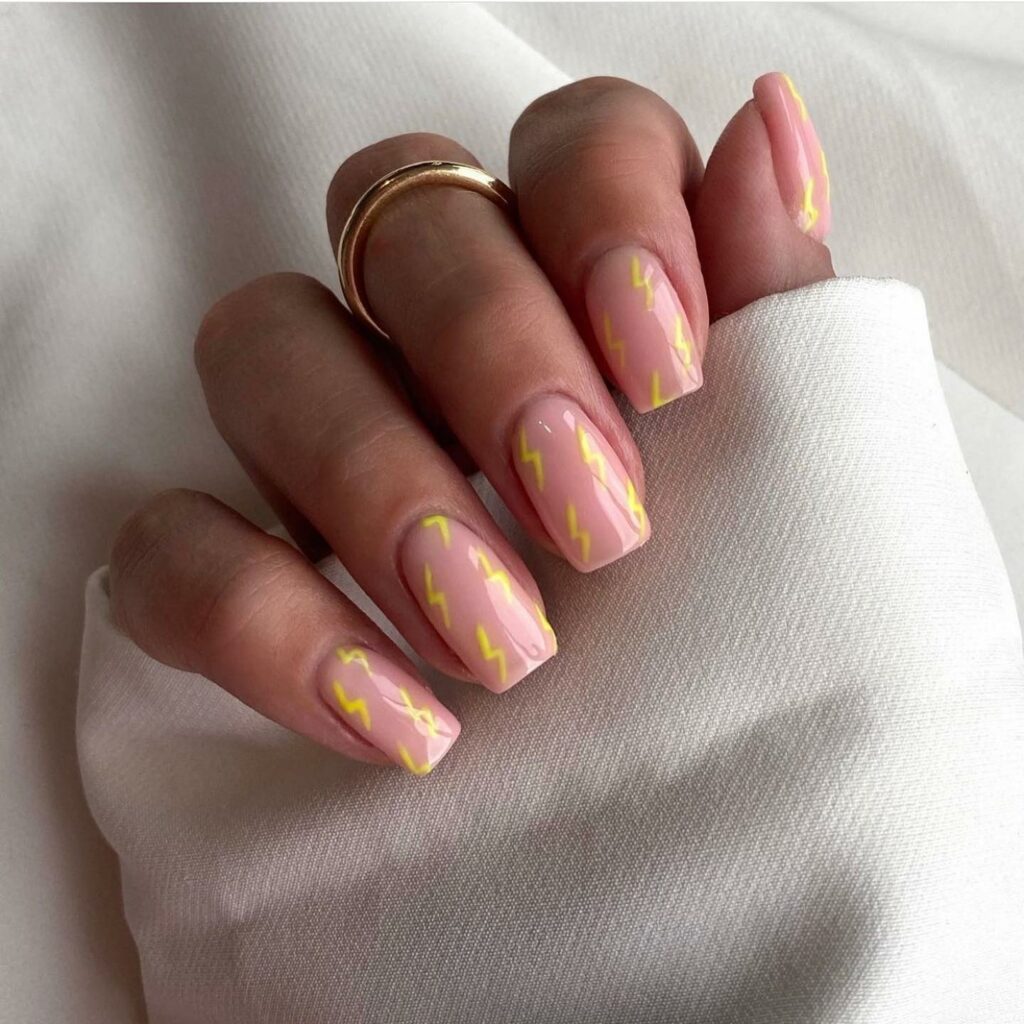 20 Latest Pink And Yellow Nail Ideas To Try In 2024! 11 Lightning Inspired Yellow Nails