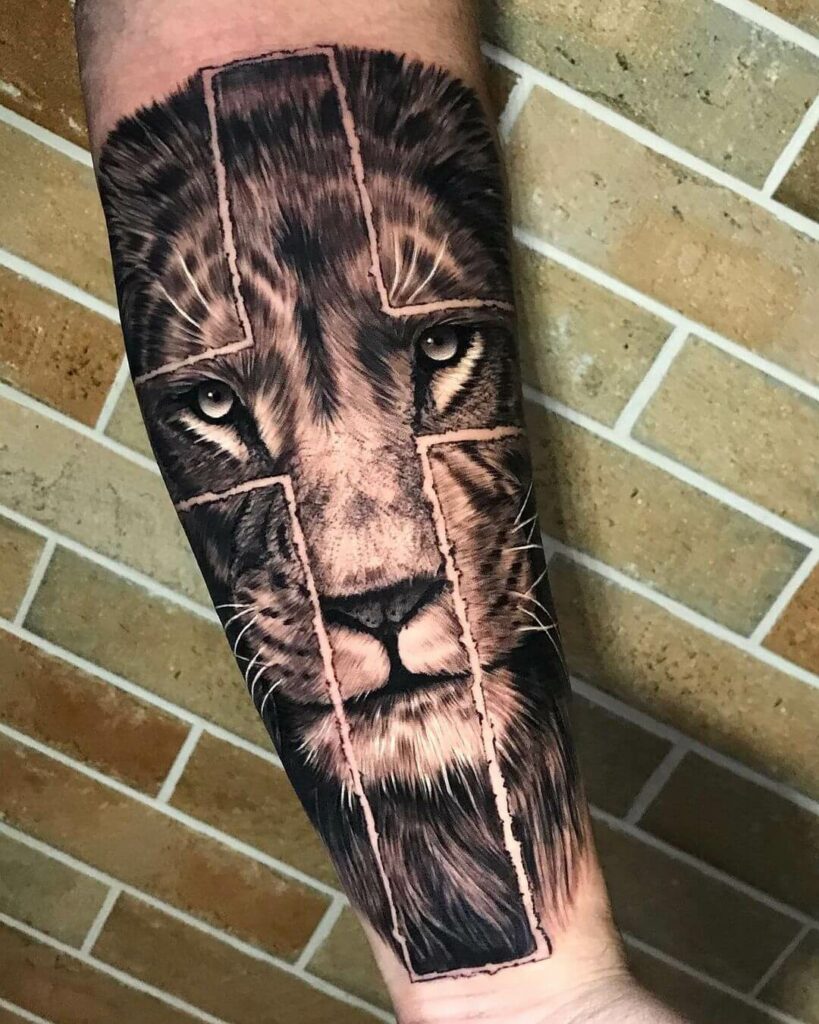 11+ Lion And Cross Tattoo Ideas That Will Blow Your Mind! 14 Lion looking through a Cross Tattoo