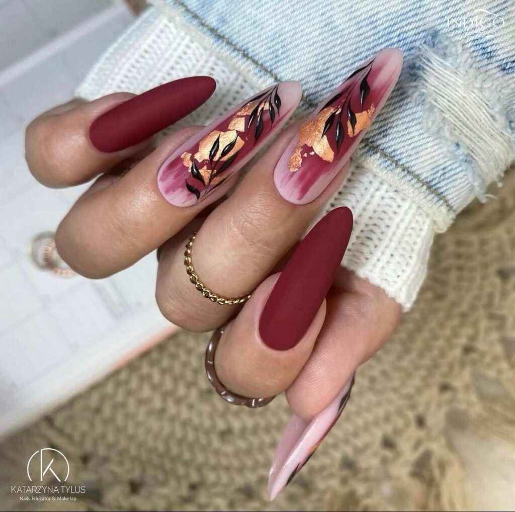 25 Latest Burgundy And Gold Nail Ideas To Try In 2024! 24 Long Stiletto Nails with Burgundy and Gold Foil