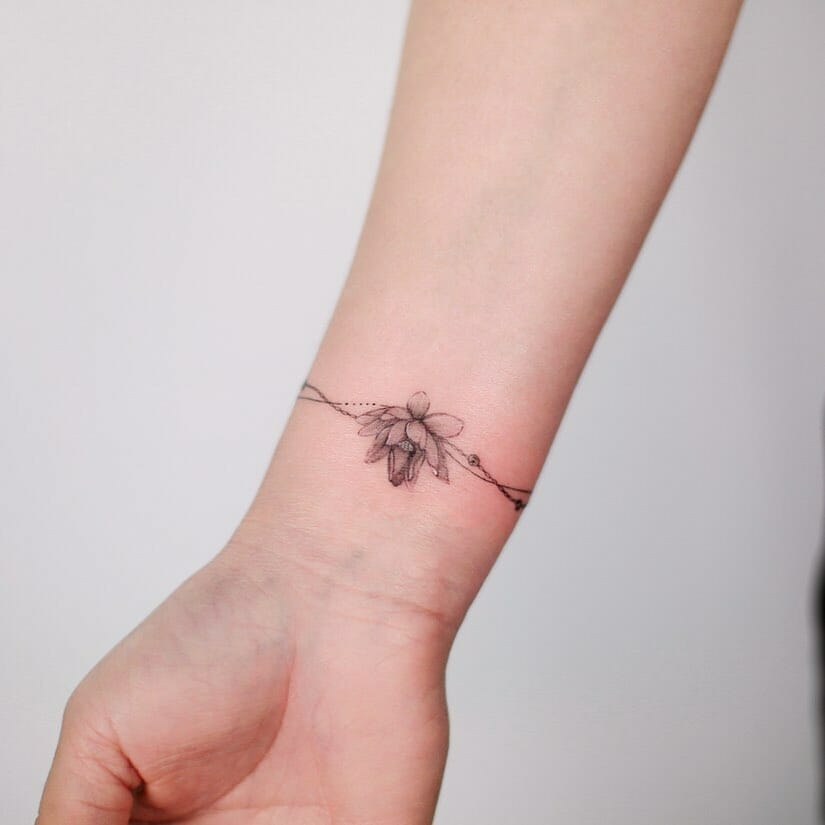 11 + Feminine Bracelet Tattoo Ideas That Will Blow Your Mind 19 Lotus Bracelet Tattoo