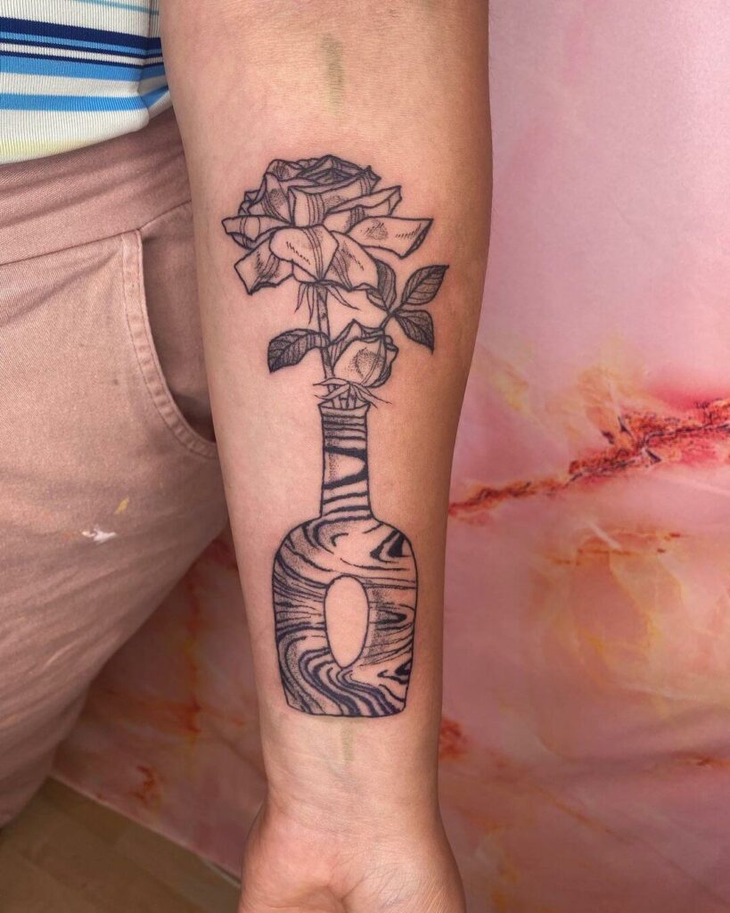 11+ Marble Tattoo Ideas That Will Blow Your Mind! 15 Lovely Marble Vase Tattoo With Flower Motif