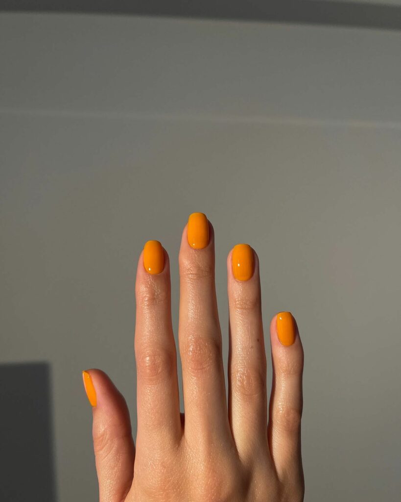 Get Creative with 39 Cute Short Nails Designs for 2024 37 Mango Orange Nails