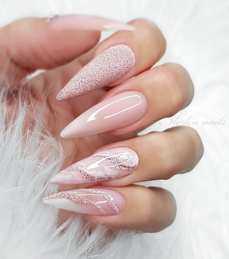 Get Festive with 20 Stiletto Christmas Nail Ideas in 2024 25 Marble Blush Pink Stiletto Christmas Nails