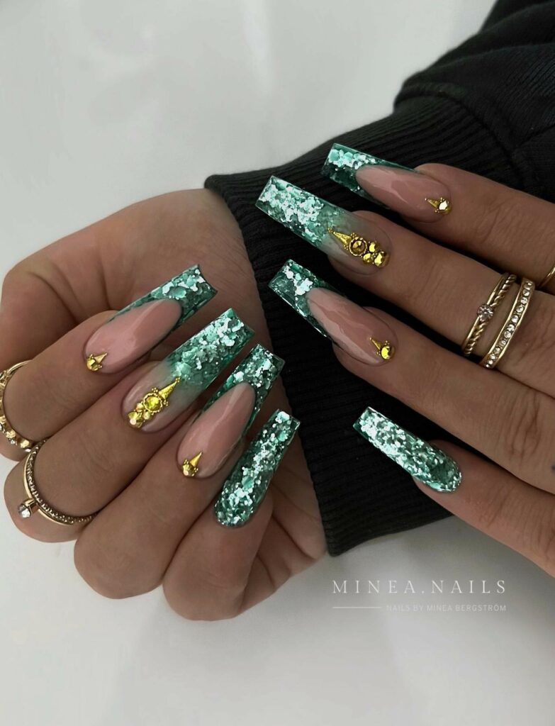33 Latest Emerald Green and Gold Nail Ideas To Try In 2024! 14 Marble-Inspired Emerald Green and Gold Nails