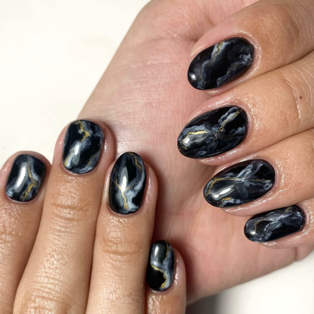 Discover 44 Trendsetting Black Nail Designs for 2024 45 Marble Gold black nails