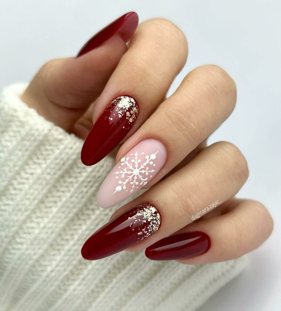 Shine Bright with 30 Red and Gold Christmas Nail Ideas in 2024 25 Burgundy Nails with Gilded Snowflakes