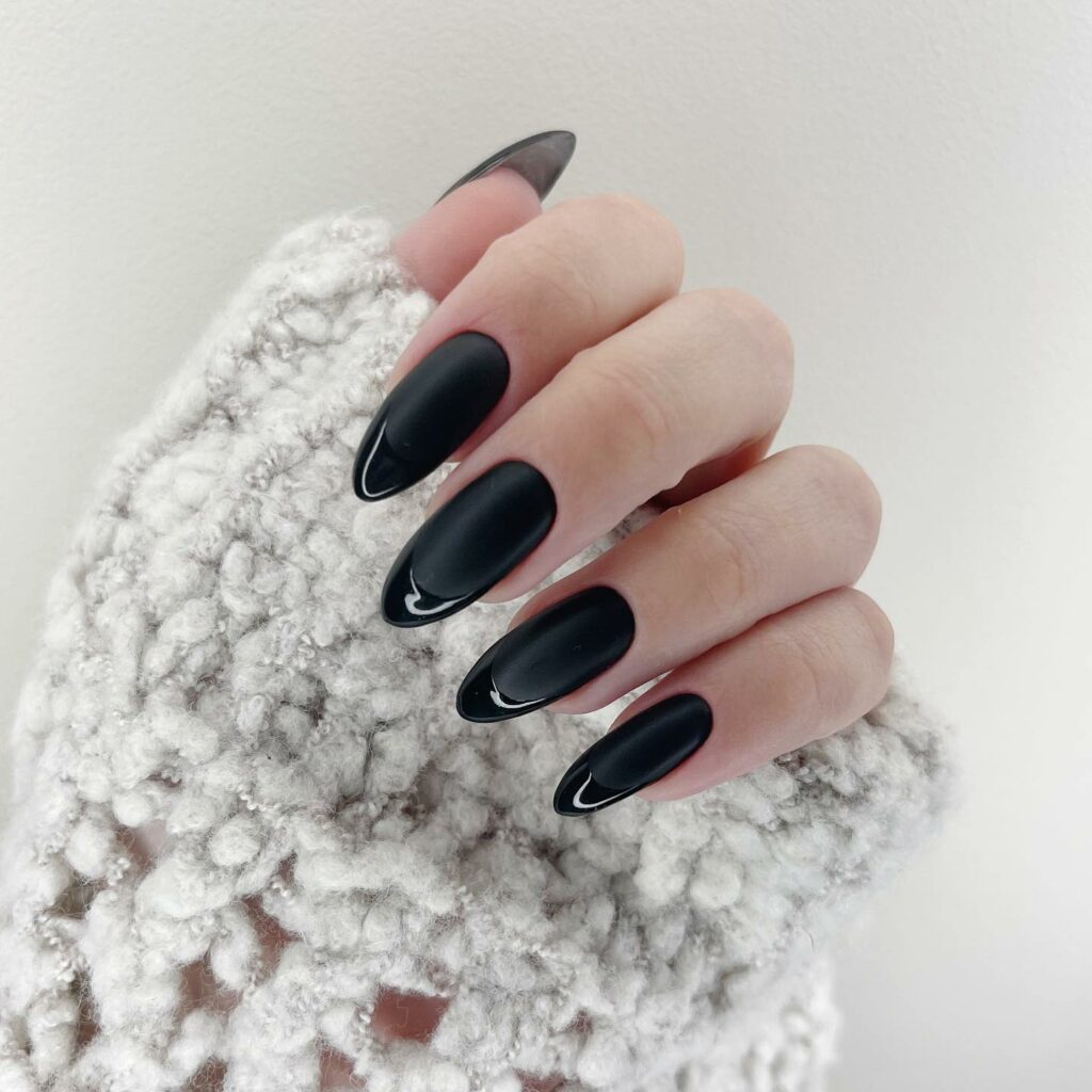 30 Latest Black Almond Nail Ideas To Try In 2024! 18 Matte Black Almond Nails with a Velvety Finish