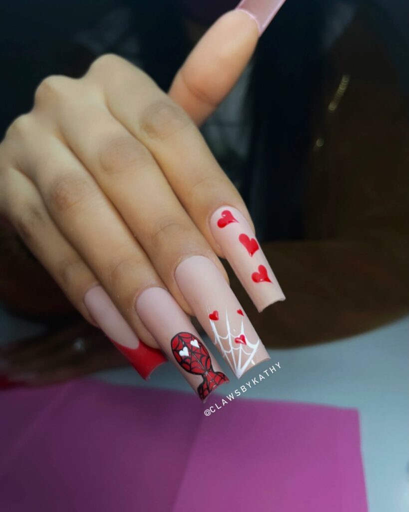 35 Amazing Spiderman Nail Designs To Try In 2024! 21 Matte Pink Spiderman Nails