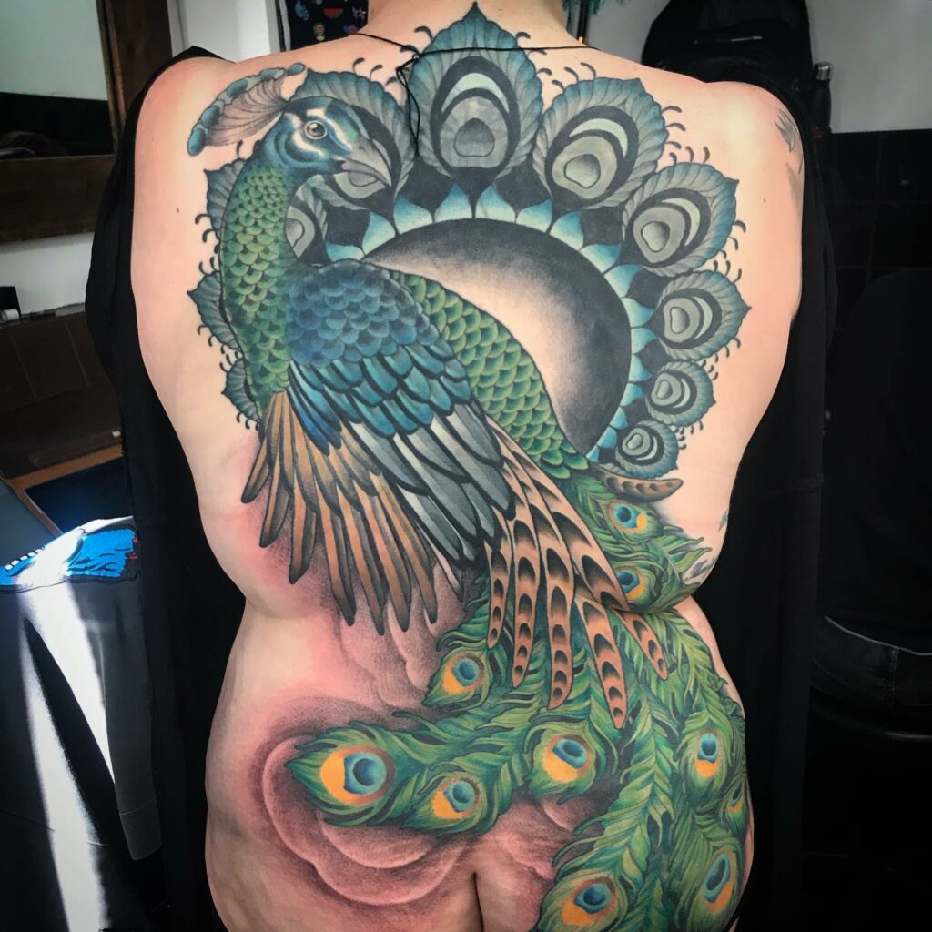 12+ Peacock Tattoo On Back Ideas To Inspire You! 18 Mesmerizing Peacock Tattoo on Back
