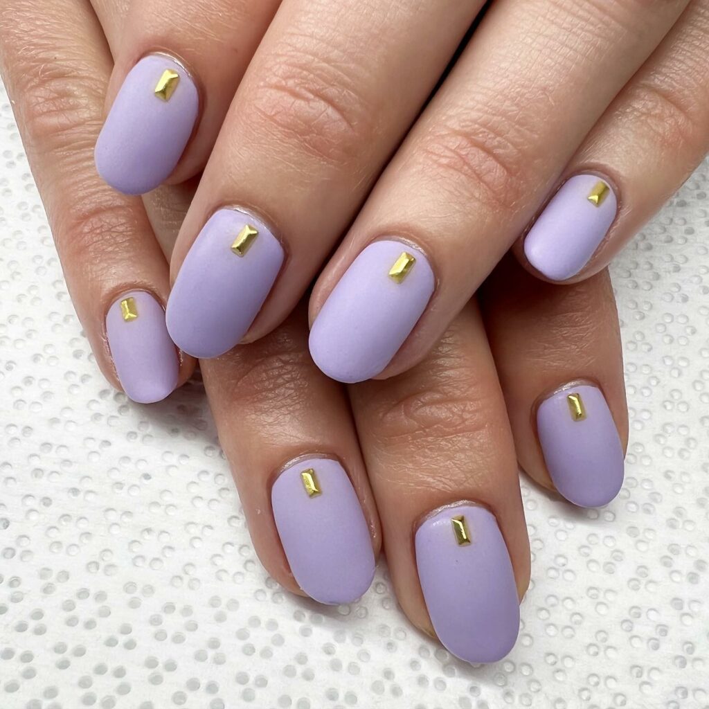 20 Latest Purple And Gold Nail Ideas To Try In 2024! 23 Purple Short Nails With Tiny Gold Bar Design