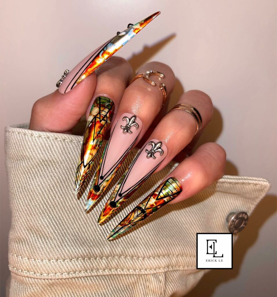 30 Latest November Nail Designs To Try This Fall 12 Metallic Marbling nails