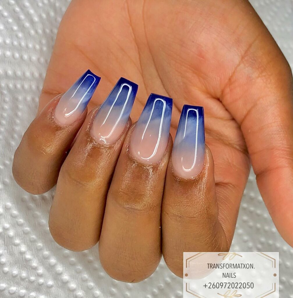 Experiment with 30 Stunning Blue Ombré Nails for 2024 26 Metallic blue ombre nails