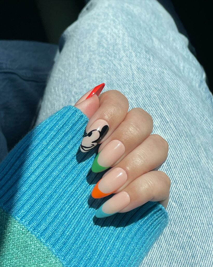 Add Whimsy with 35 Mickey Mouse Nail Designs in 2024 19 Mickey Mouse Meets Colorblock Nails