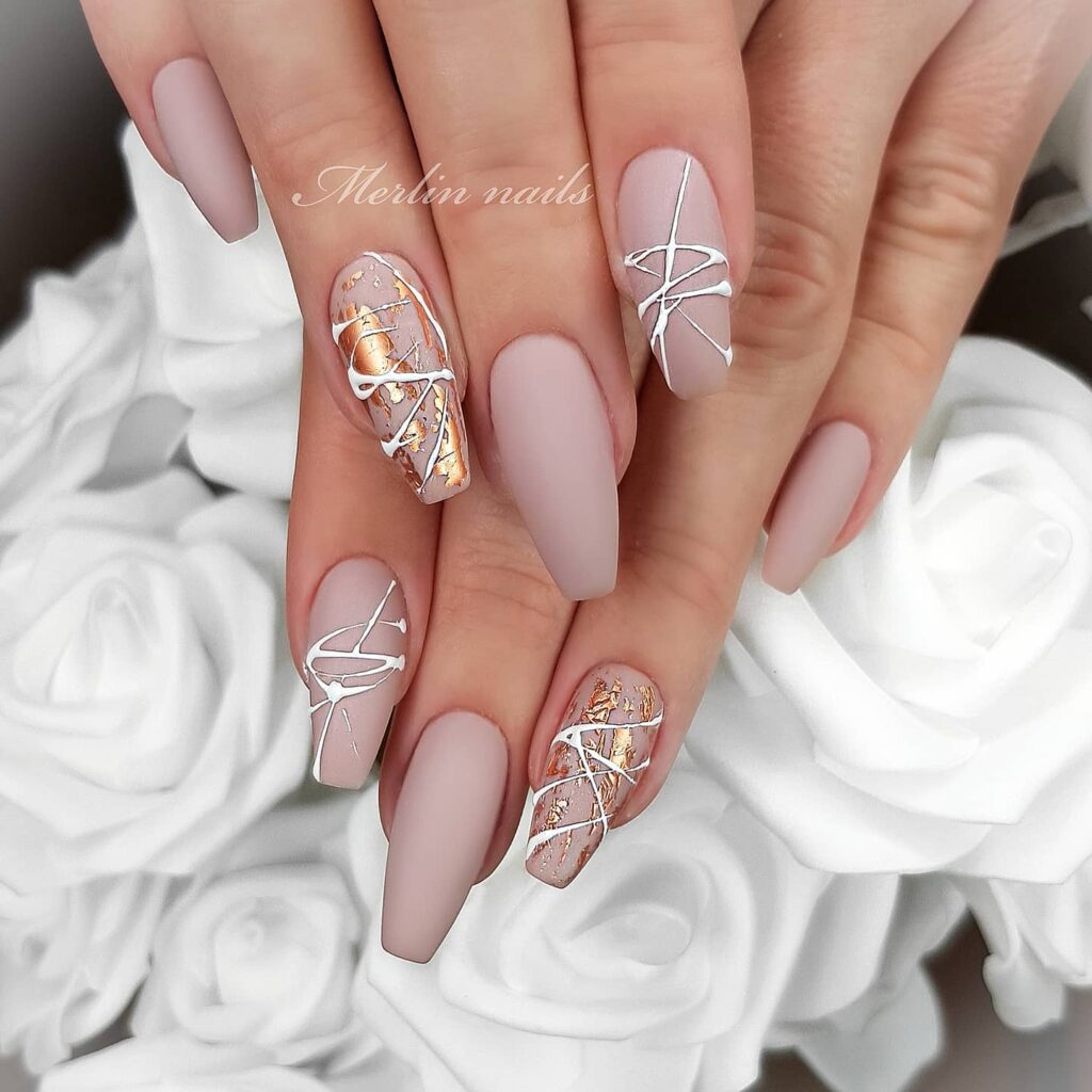 Shine Bright with 50 Rose Gold Nail Designs for 2024 39 Milky Matte Pink rose gold nails
