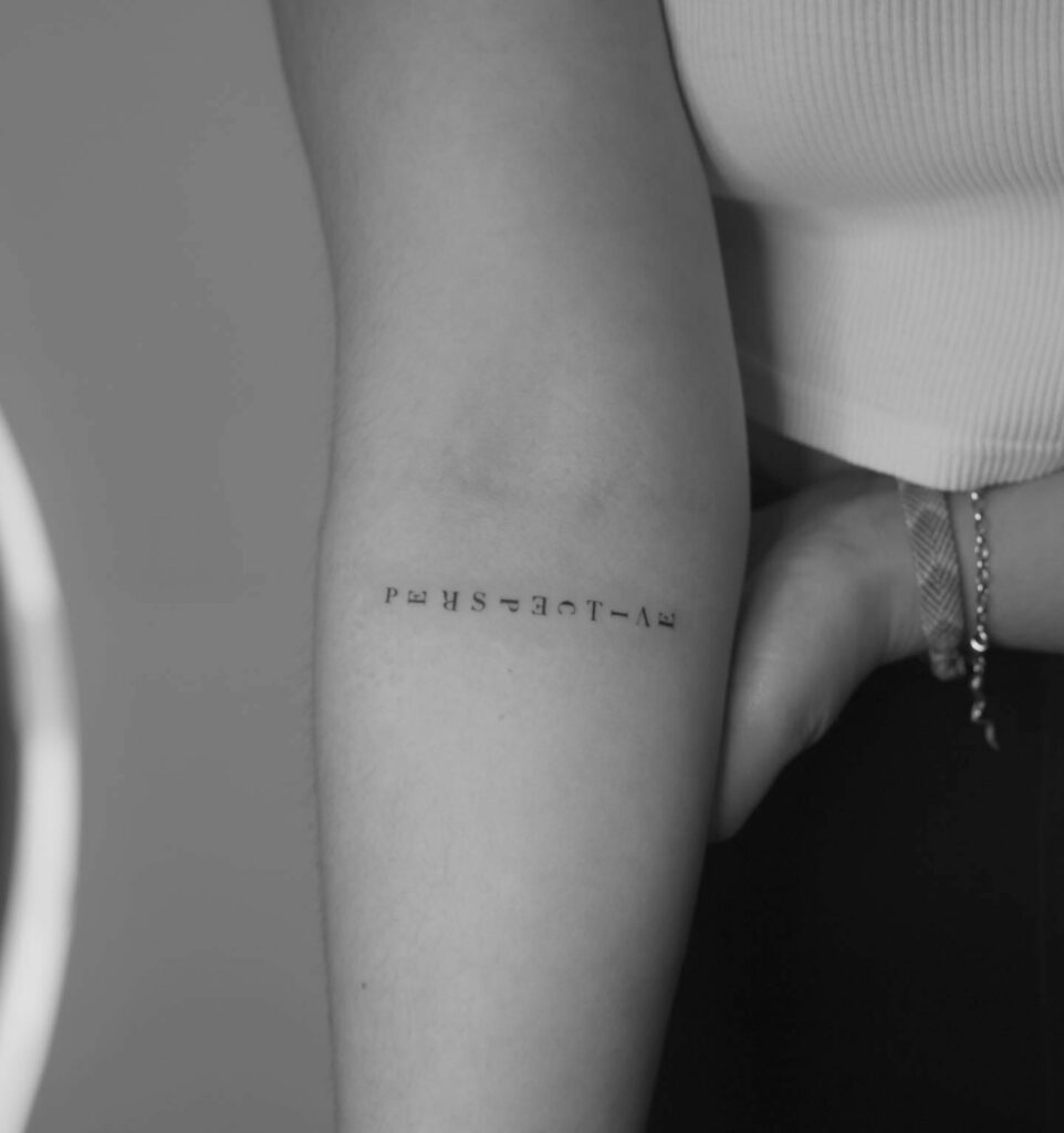 20+ Aged Fine Line Tattoos That Will Blow Your Mind 22 Minimal Word Tattoos